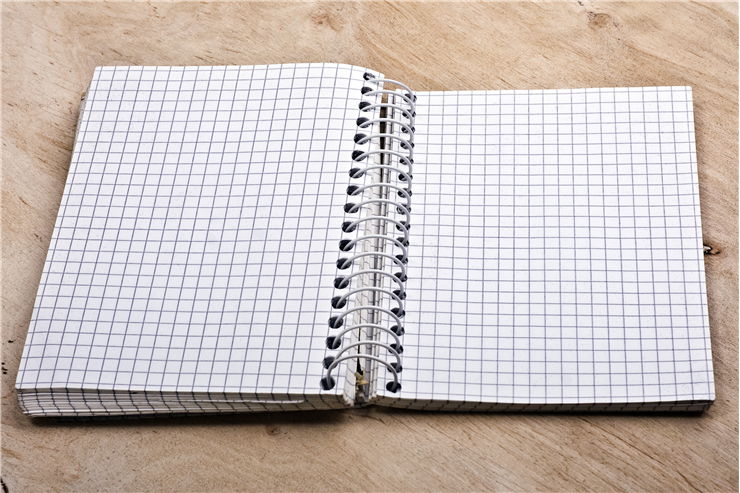 Blank Notepad on Desk