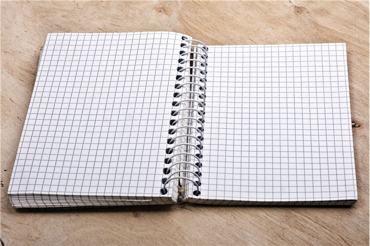 Blank Notepad on Desk